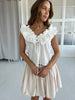 Elli White ruffle blouse