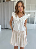 Elli White ruffle blouse